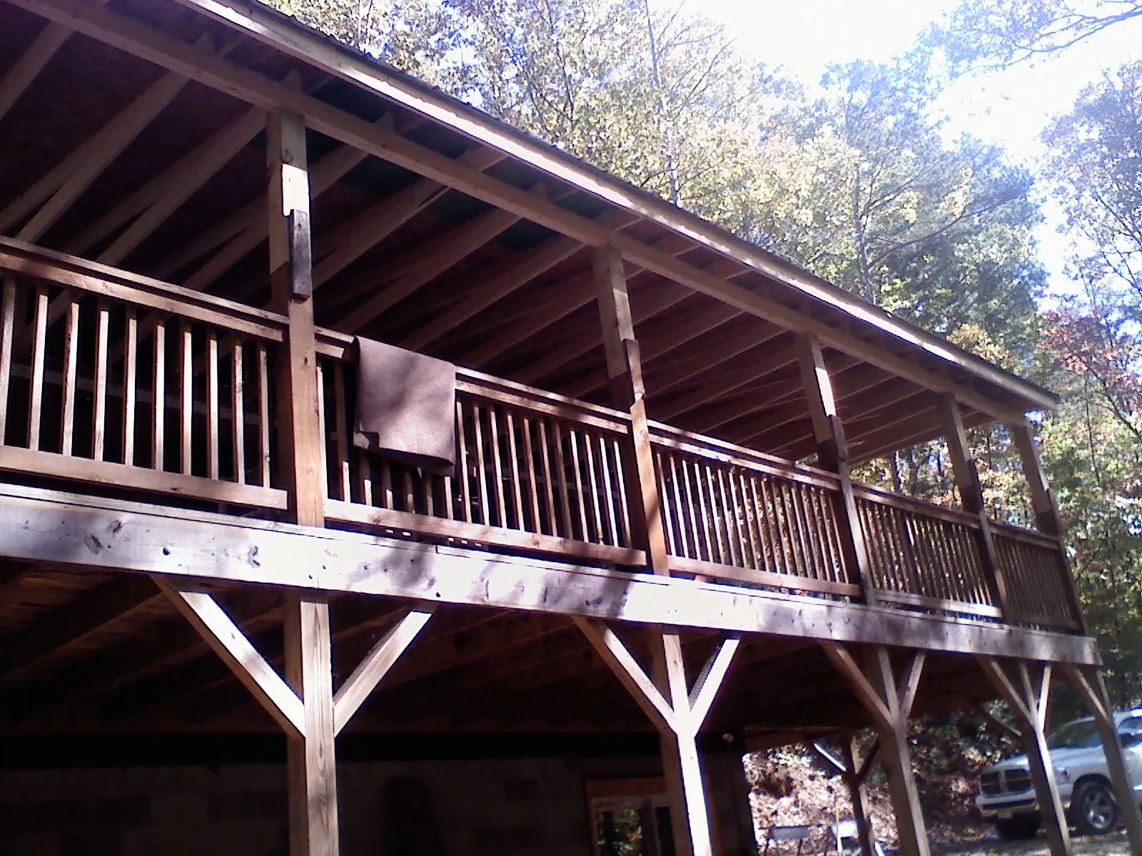 Timber framing under a new elevated porch and deck — Roof Leak Repair in Malmo by Roofing Brothers